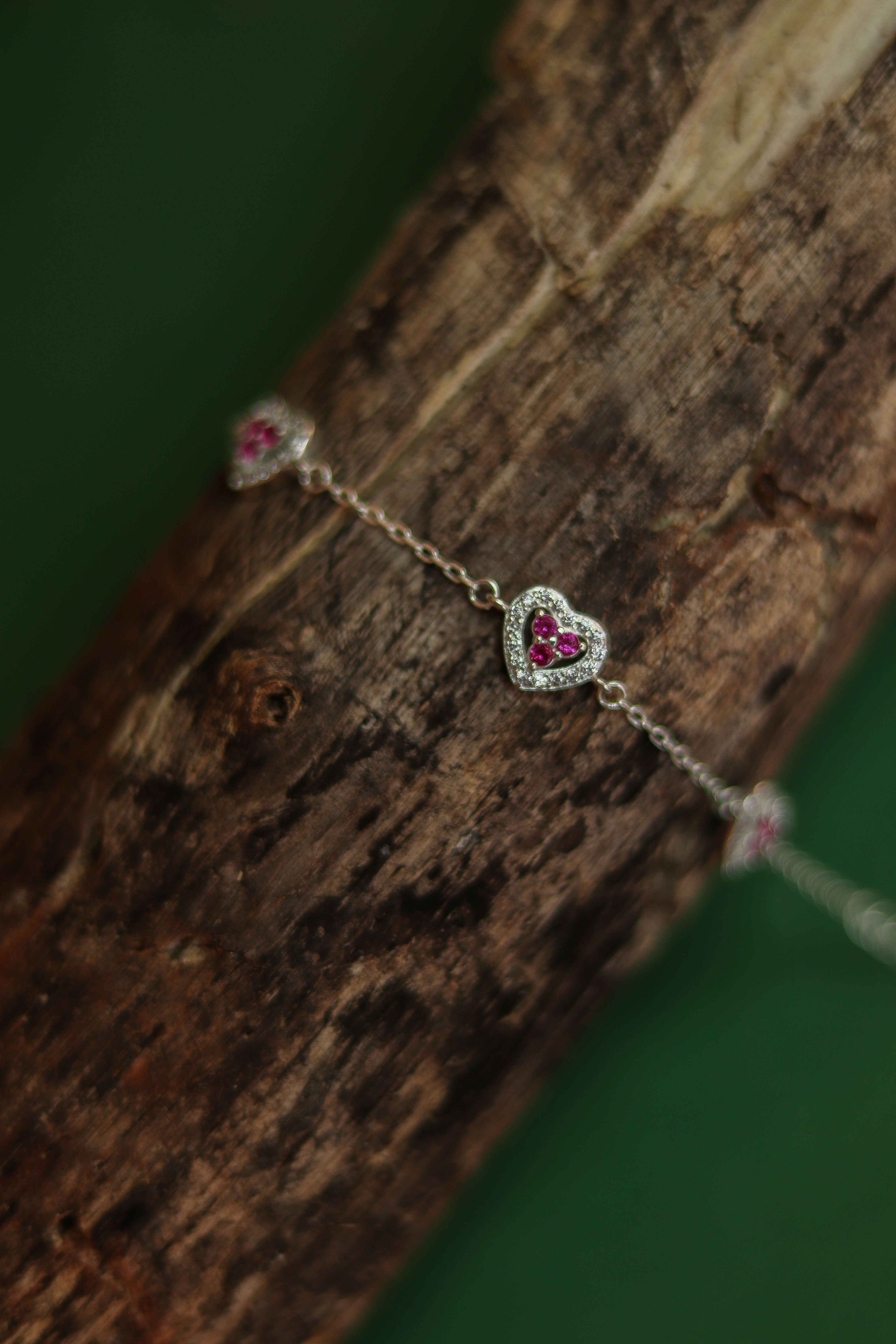Pulseira 5 corações rosa